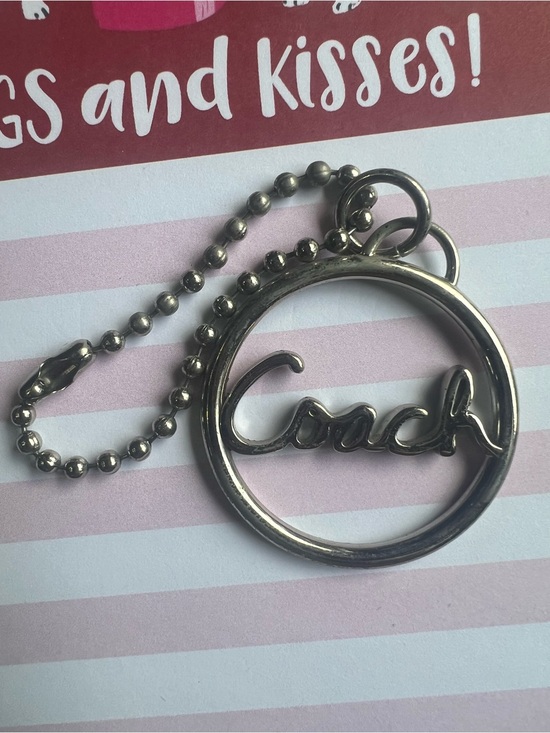 Coach Handbags - Coach silver circle hang tag